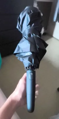 Haven Umbrella customer photo 1: Tested the umbrella: it opens and closes by pressing the button.